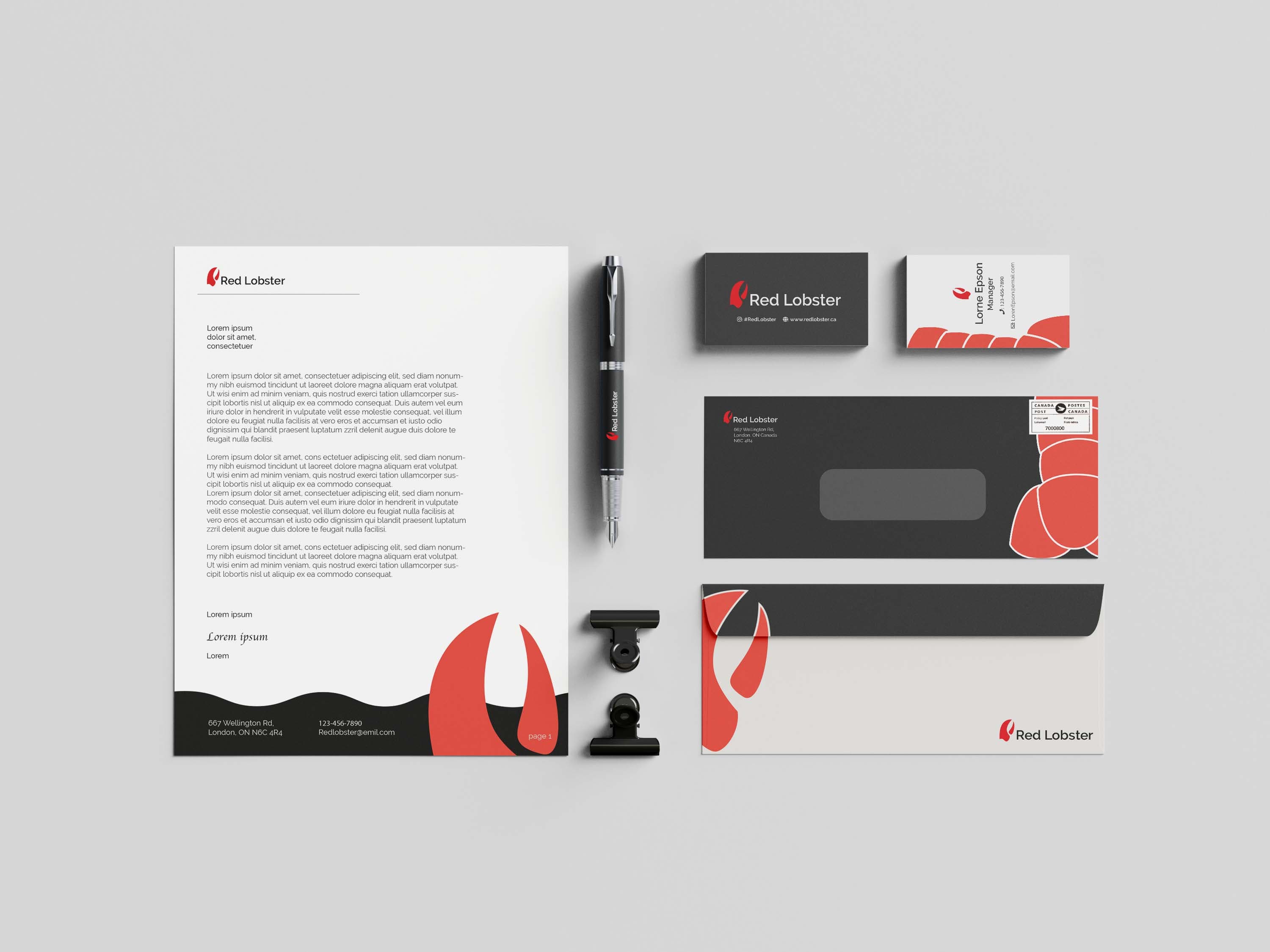 Final stationery — business card, letterhead, and envelope on the new system